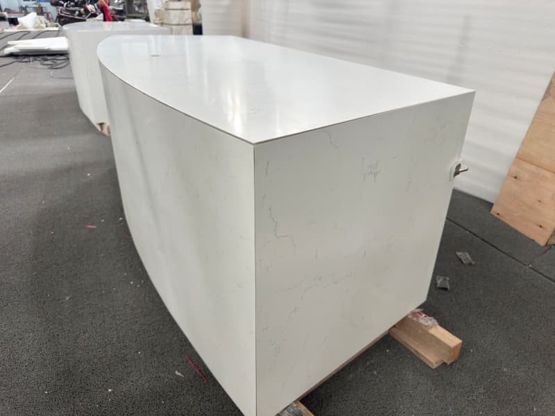 Curved counter with wooden cabniet Curved counter with wooden cabniet