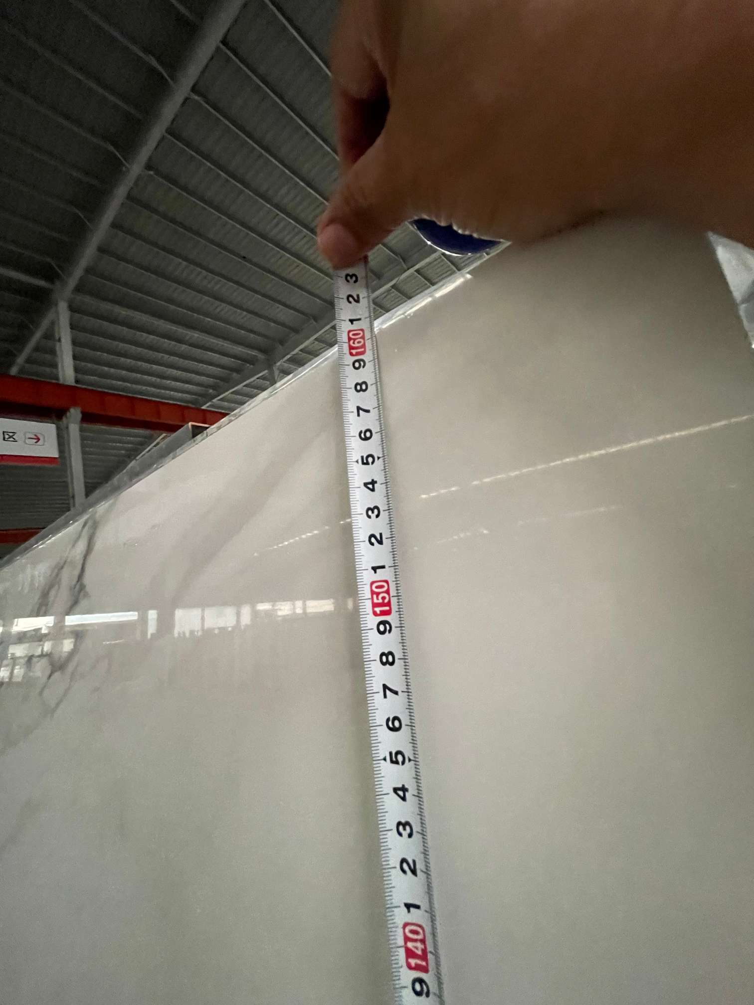 Measuring 1600 mm width of sintered stone slab for Chile project