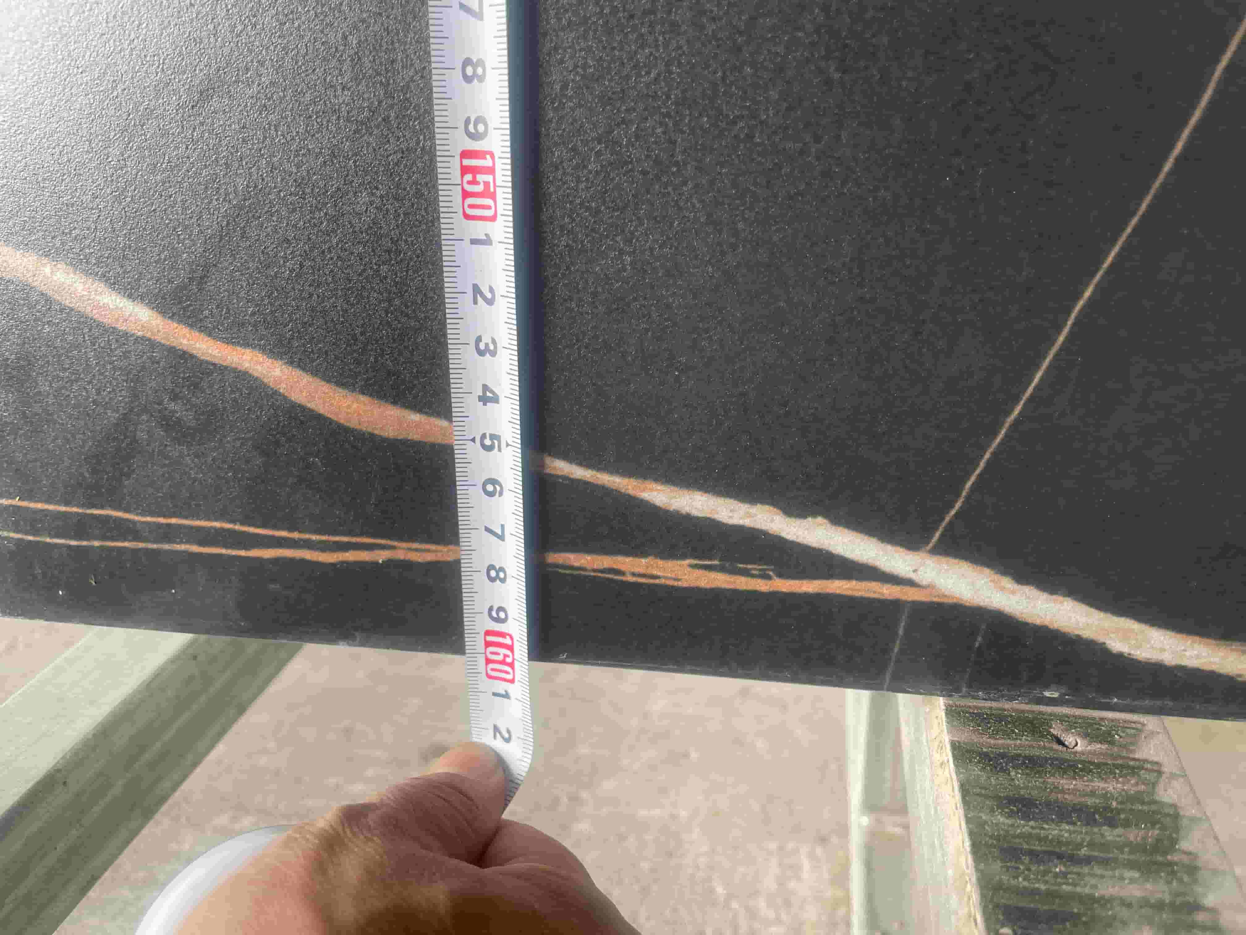 Marquina sintered stone slab height measurement before shipment