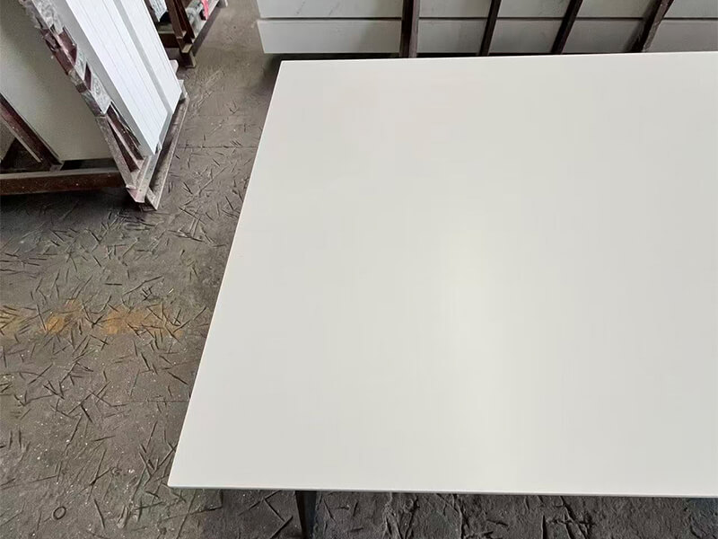 Pure White Velvet Sintered Stone Table Top Close-Up Picture Pure White Velvet Sintered Stone Table Top Close-Up Picture