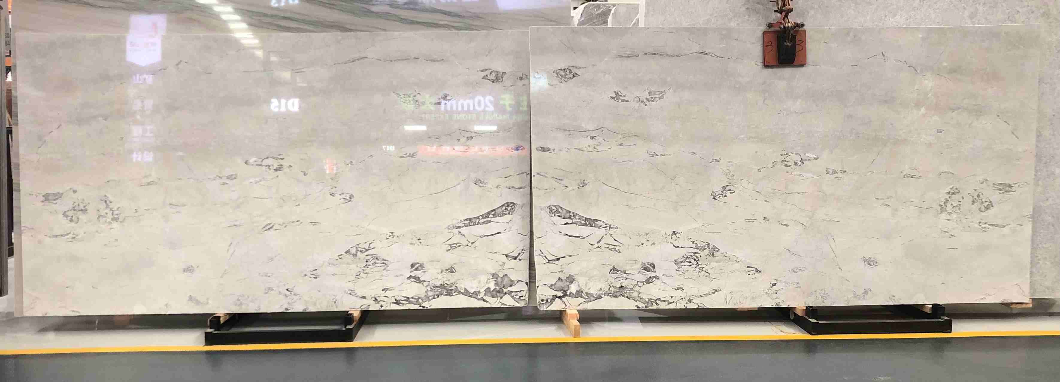 Bookmatched Chinese Fendi White Marble slabs with soft light-grey veins