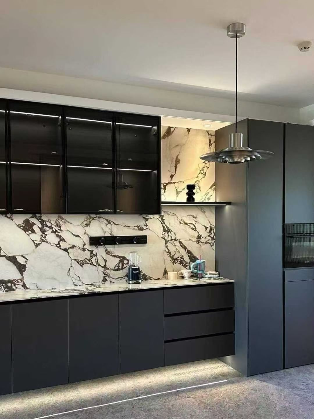 Calacatta Viola Kitchen Countertop and Backsplash Calacatta Viola kitchen countertop and full-height marble backsplash