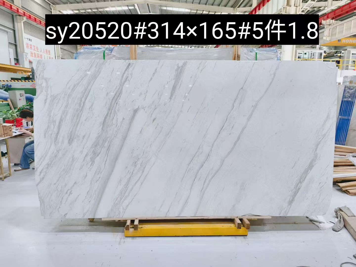Spider Quarry Volakas Marble - Long Diagonal Grey Veining Spider Quarry Volakas marble slab with long diagonal grey veins on a white background