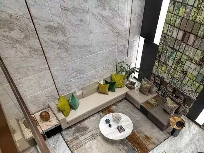Volakas Marble Wall Cladding with Soft Grey Veining Volakas marble wall cladding with soft diagonal grey veining in a modern interior