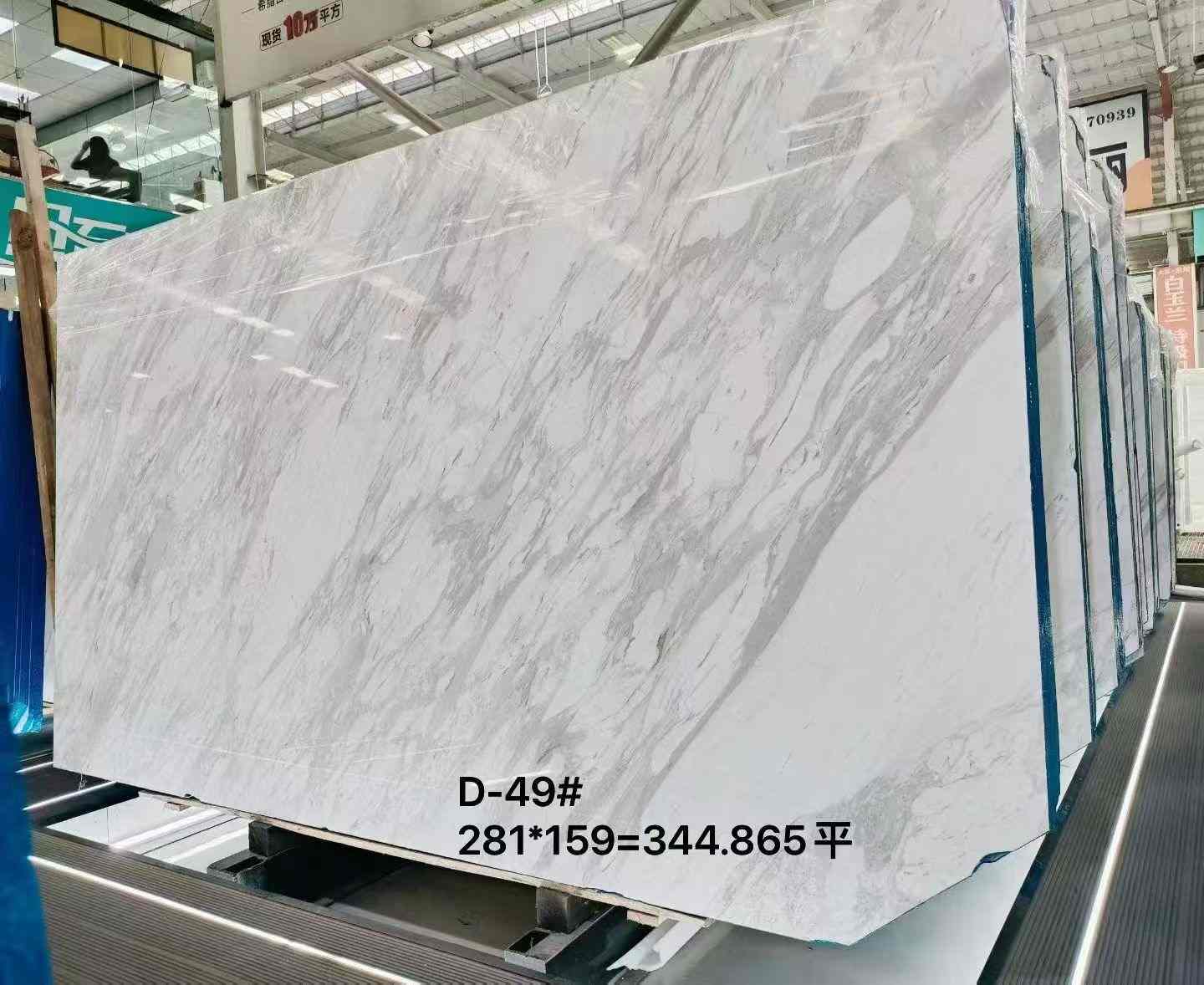 Large Quarry Volakas Marble - Dense Flowing Vein Pattern Large Quarry Volakas marble slab with dense flowing grey veining and strong movement