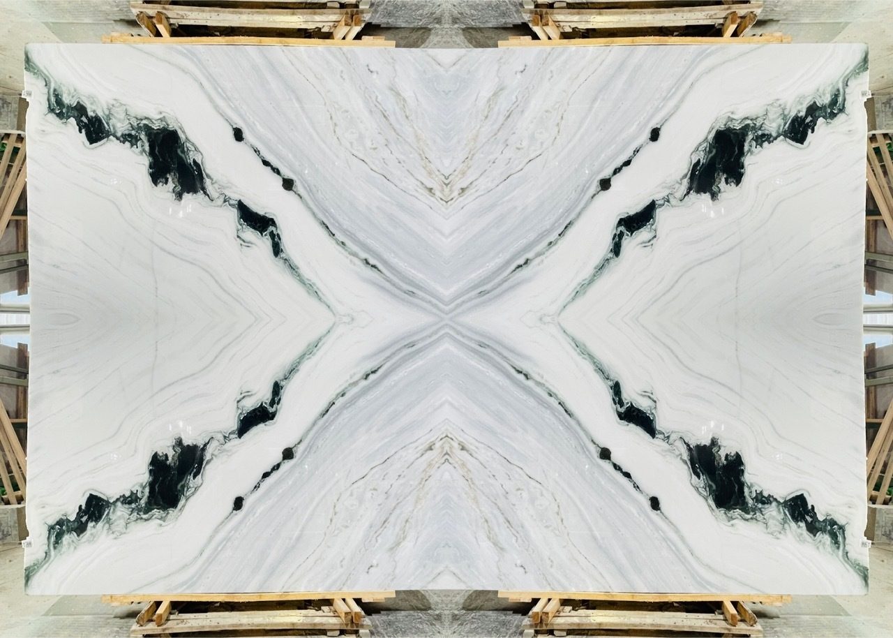 Lower-selection Panda White Marble slab with broken black veins and concentrated dark spots