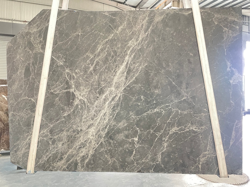 Hermes Grey Marble slab showing finer white-grey veins distributed across the surface
