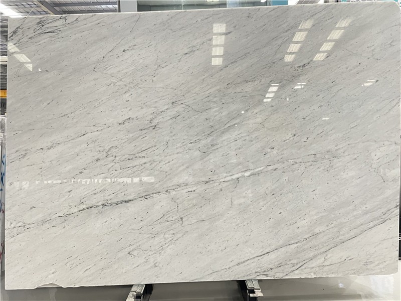 Carrara White marble slab with soft gray veining