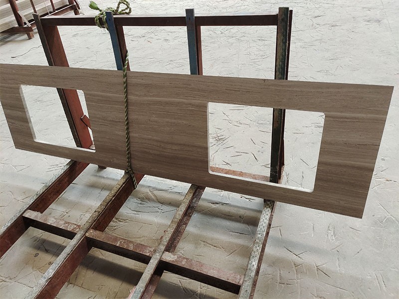 White Wooden Marble countertop or vanity piece with rectangular cutouts and continuous linear grain