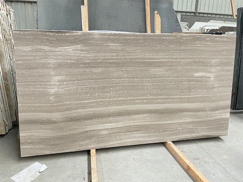 White Wooden Marble slab with deeper grey-white background and broader linear wood-grain bands