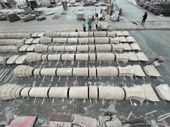 White Magnolia Marble column components arranged at the factory