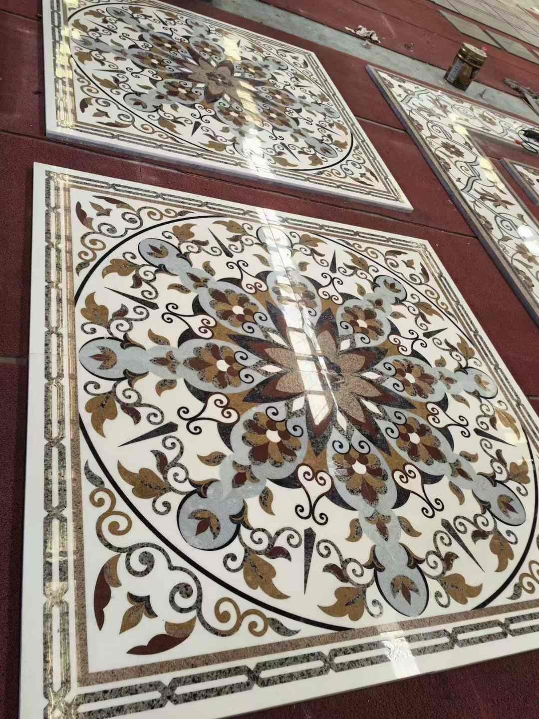 Multi-color floral waterjet stone inlay with detailed scrollwork and narrow outlines